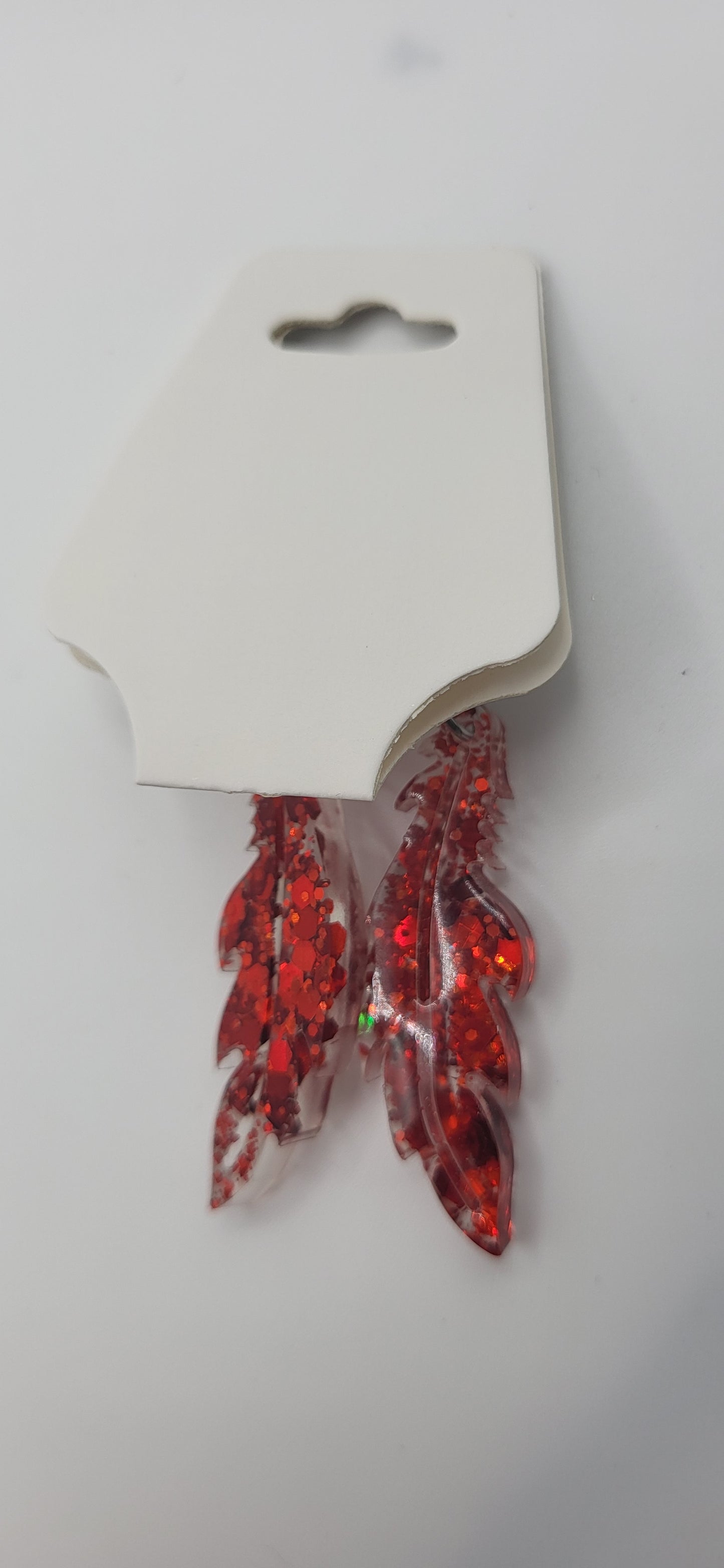 Boucles d’oreilles paillettes rouge forme feuilles